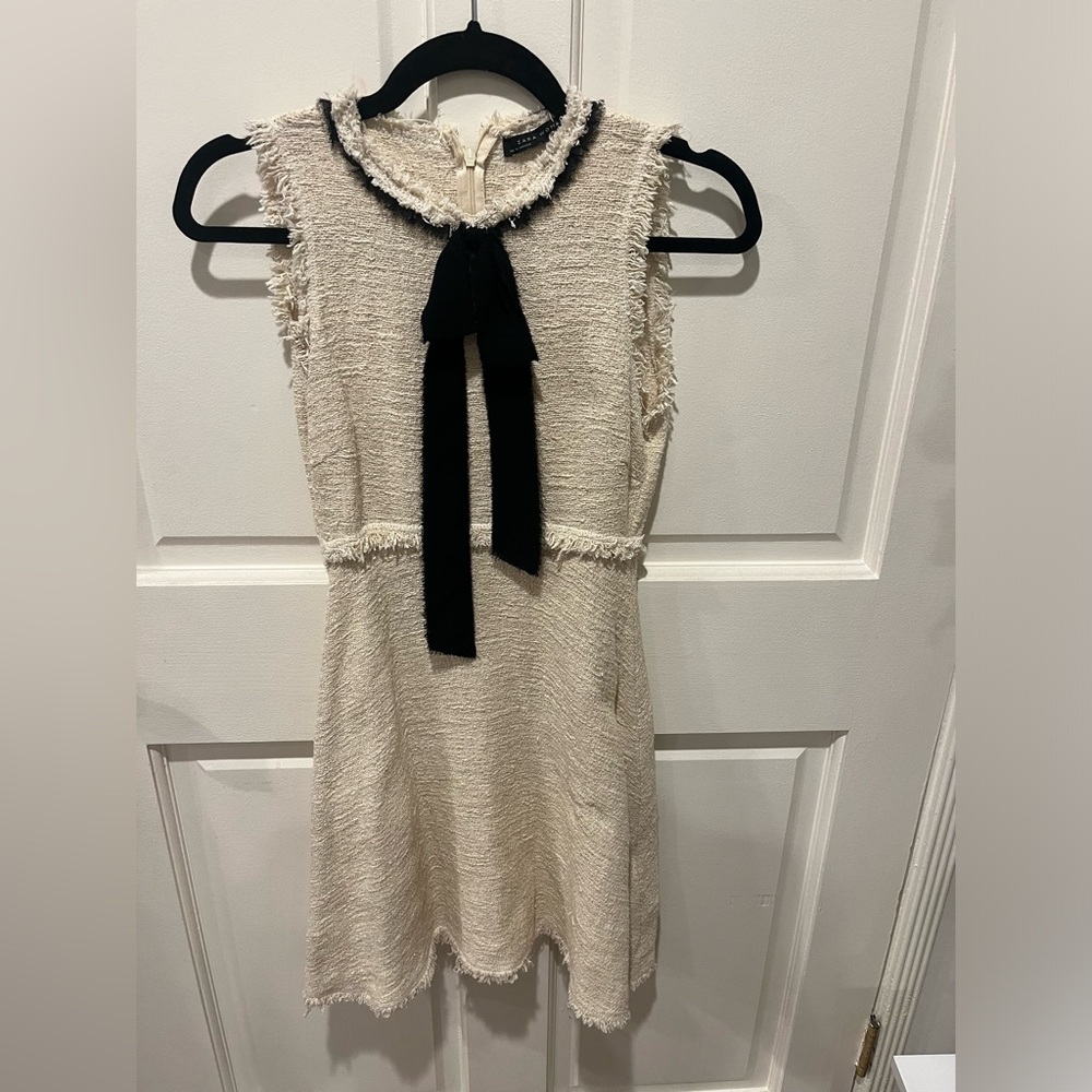 Tweed dress by Zara Woman with a bow tie